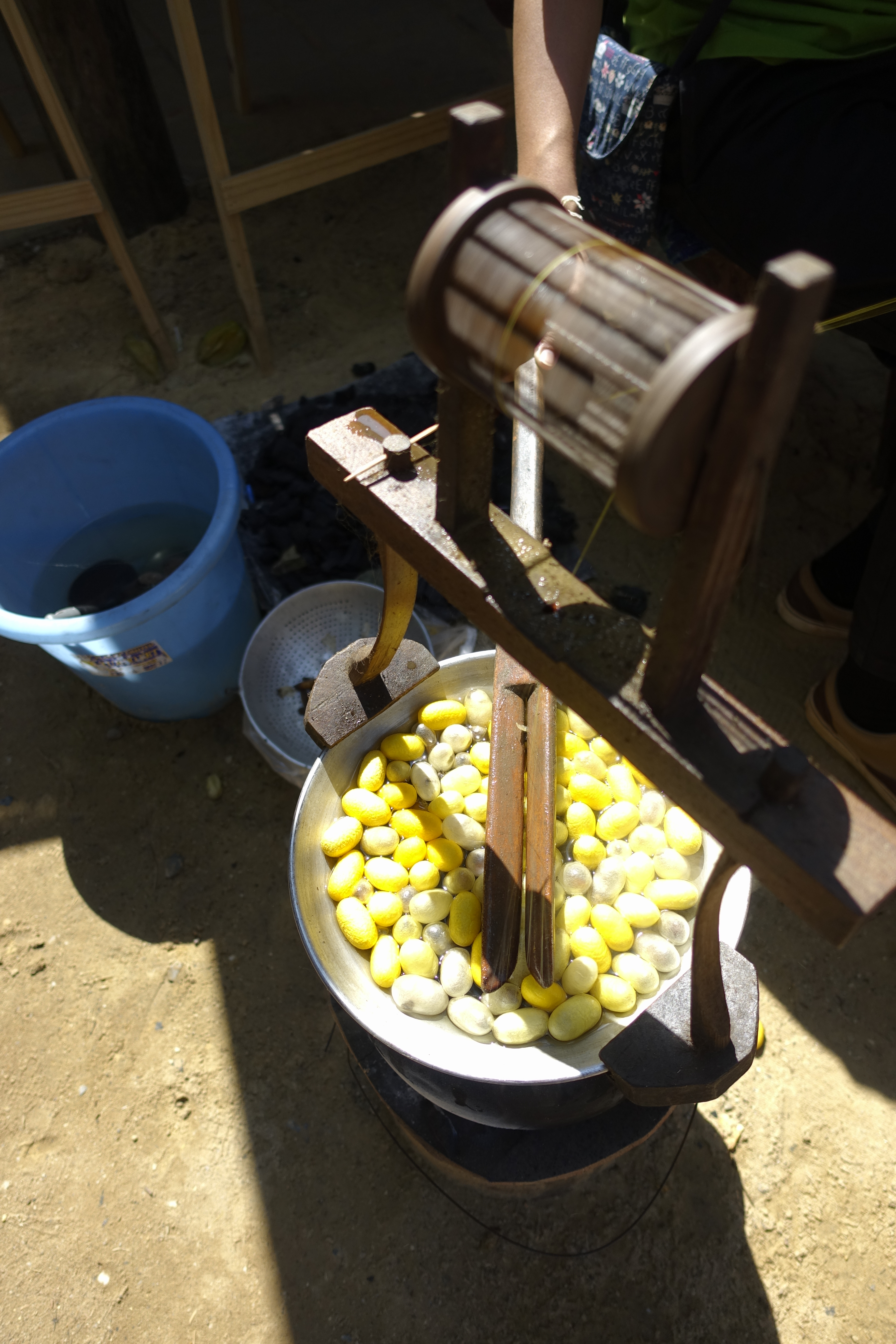 Boiling Silkworm Cocoons and Spinning Thread